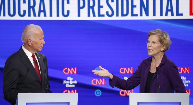 Democratic presidential candidate former Vice President Joe Biden and Sen. Elizabeth Warren, D-Mass., participate in a Democratic presidential primary debate hosted by CNN/New York Times at Otterbein University, Tuesday, Oct. 15, 2019, in Westerville, Ohio. (AP Photo/John Minchillo)