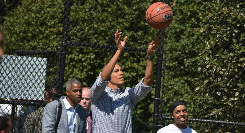 Then-US President Barack Obama, pictured in 2015, selected North Carolina's men and Connecticut's women to win the NCAA basketball tournament