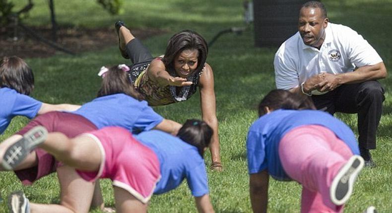 Michelle Obama working out with others