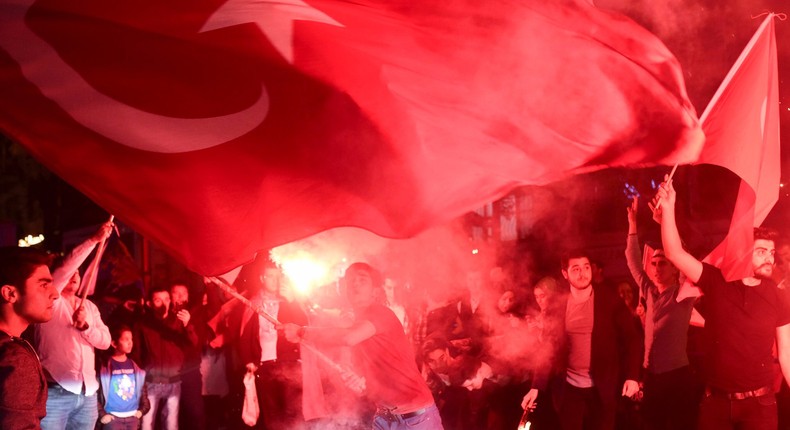 Supporters of Turkish President Tayyip Erdogan celebrate in Istanbul.