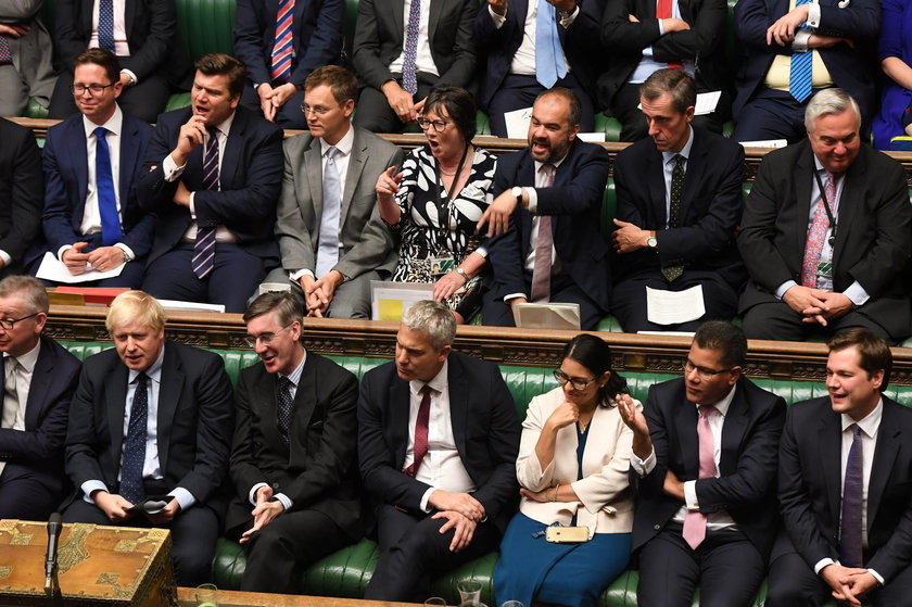 Britain's Prime Minister Boris Johnson, Chancellor of the Duchy of Lancaster Michael Gove, and leade