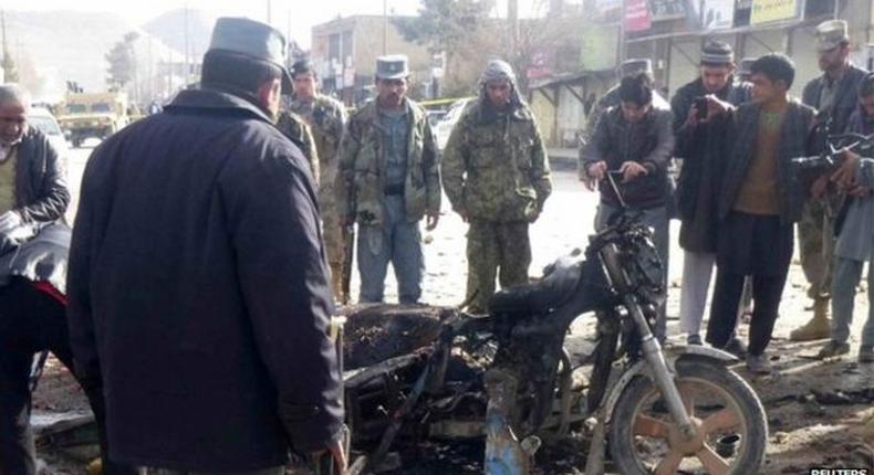 Suicide bomber on motorcycle kills 15 near Afghan market