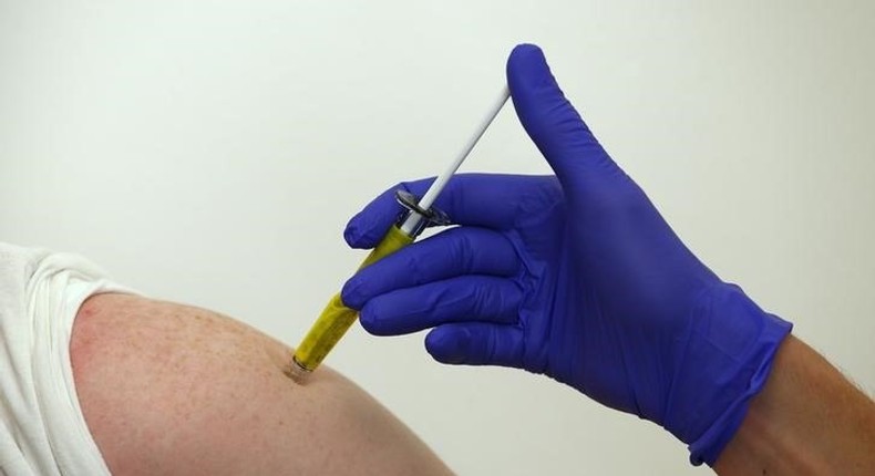 A volunteer receives a trial Ebola vaccine at the Centre for Clinical Vaccinology and Tropical Medicine in Oxford, southern England January 16, 2015. 