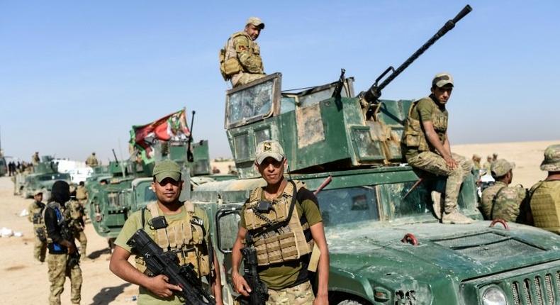 Forces from Iraq's elite Rapid Response Division, at the forefront of the southern advance on Mosul, deployed near the village of Tall al-Tibah, some 30 kilometres south of the jihadist-held city on October 21, 2016