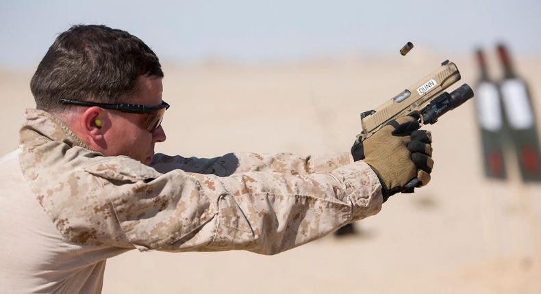 A US Marine fires an M1911 during a training exercise in January 2016.US Marine Corps/Cpl. Joshua W. Brown