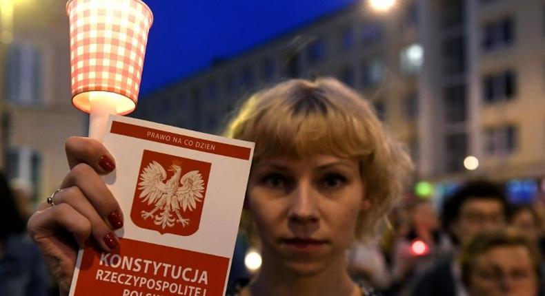 Protesters demonstrate in front of the Polish Supreme Court in Warsaw on July 23, 2017