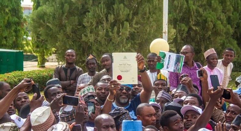 Dino Melaye receives his certificate from ABU