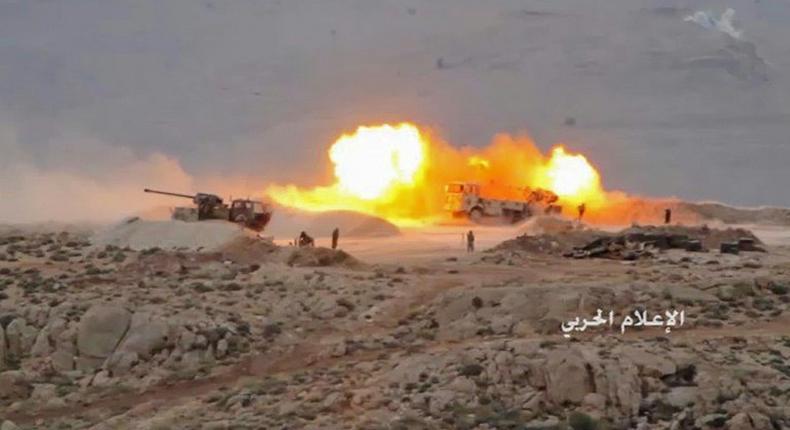 A picture released by Lebanese Shiite militant group Hezbollah on July 21, 2017 shows artillery firing towards a jihadist position in Jurud Arsal, a mountainous region on the border with Syria