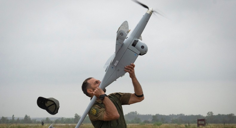 A Ukrainian soldier launches FlyEye WB Electronics SA, a Polish reconnaissance drone, which is in service with the Ukrainian army, in Kyiv region, Ukraine, Tuesday, Aug. 2, 2022.AP Photo/Efrem Lukatsky, File