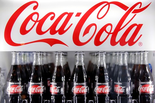 Bottles of Coca-Cola are pictured in a cooler during a news conference in Paris