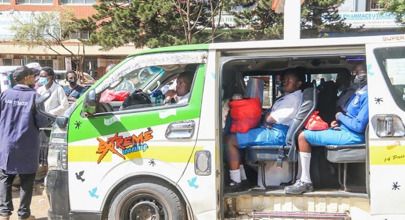 Students going to school in a Matatu