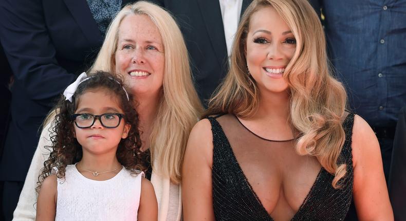 Mariah Carey with her mother, Patricia, and daughter, Monroe, on the Hollywood Walk of Fame.Chris Pizzello/Invision/AP)