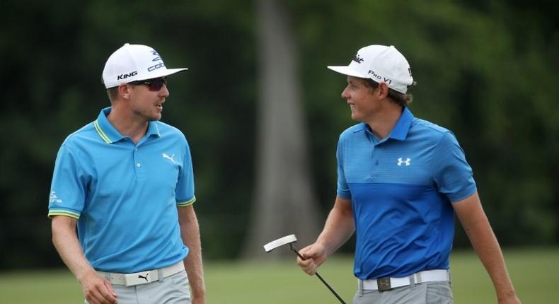 Jonas Blixt of Sweden and Cameron Smith of Australia react to their putt on the sixth green during the third round of the Zurich Classic, at TPC Louisiana in Avondale, on April 29, 2017