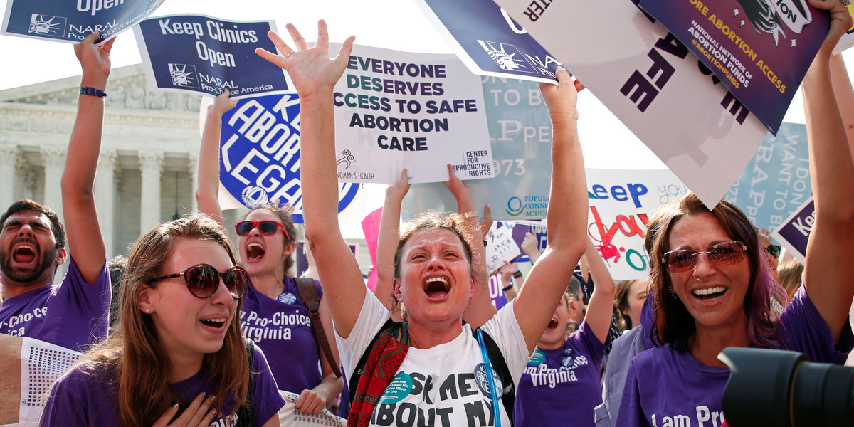 Demonstrators celebrate after the court struck down a Texas law imposing strict regulations on abortion doctors and facilities that its critics contended were designed to shut down clinics.