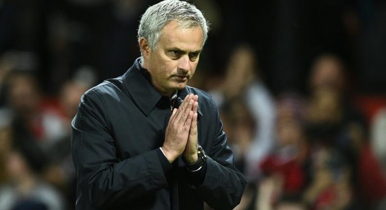 Manchester United's Portuguese manager Jose Mourinho gestures to supporters after their match against Manchester City October 26, 2016