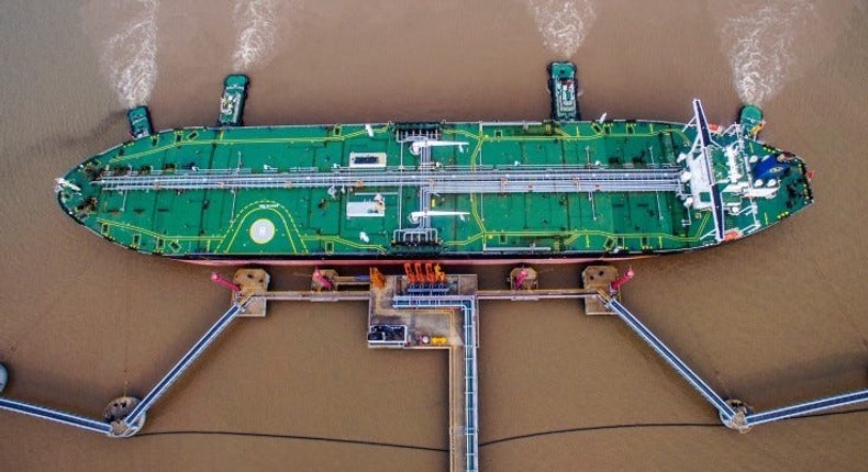 Oil tanker unloads crude oil at a crude oil terminal in Zhoushan