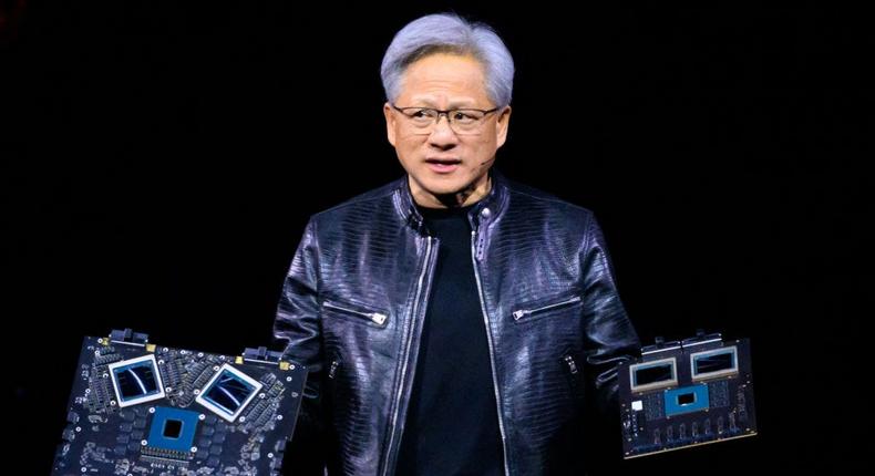 NVIDIA's CEO Jensen Huang displays products on-stage during the annual Nvidia GTC Artificial Intelligence Conference at SAP Center in San Jose, California, on March 18, 2024.JOSH EDELSON/Getty Images