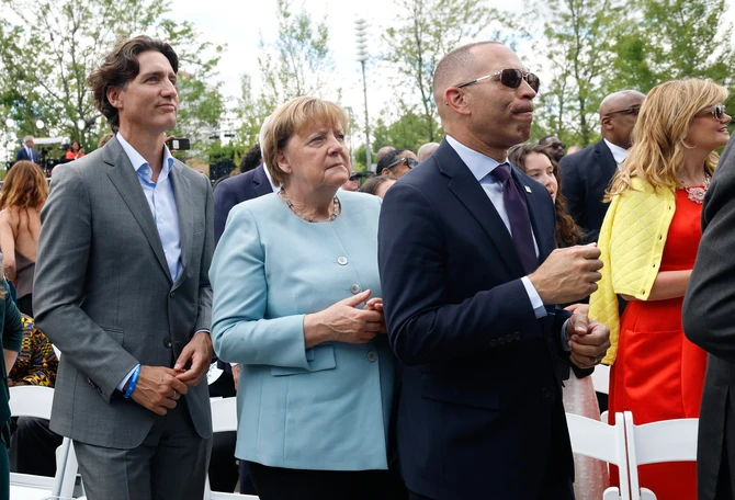 Džastin Trudo i Angela Merkel 