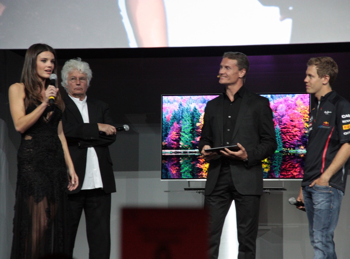 Supermodelka Gemma Sanderson, rezyder Jean-Jacques Annaud i kierowca Formuły 1 Sebastian Vettel