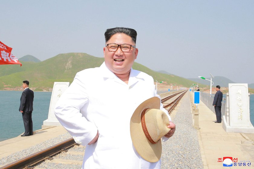 North Korean leader Kim Jong Un inspects the completed railway that connects Koam and Dapchon, in th