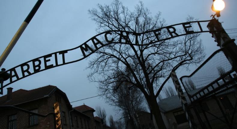 Merkel will walk through the infamous gate of the Auschwitz death camp