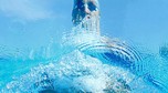 Sludnov of Russia is seen from underwater as he swims in the men's 100m breaststroke heats at the European Swimming Championships in Budapest