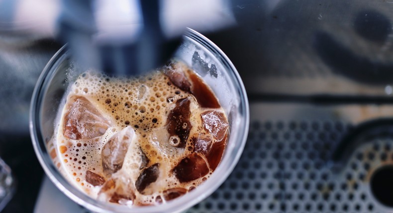 An iced coffee at a self-service machine.bee32/Getty Images