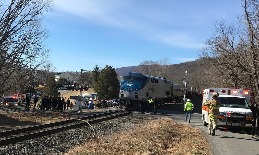 View of the scene following the accident when a train traveling from Washington to West Virginia car