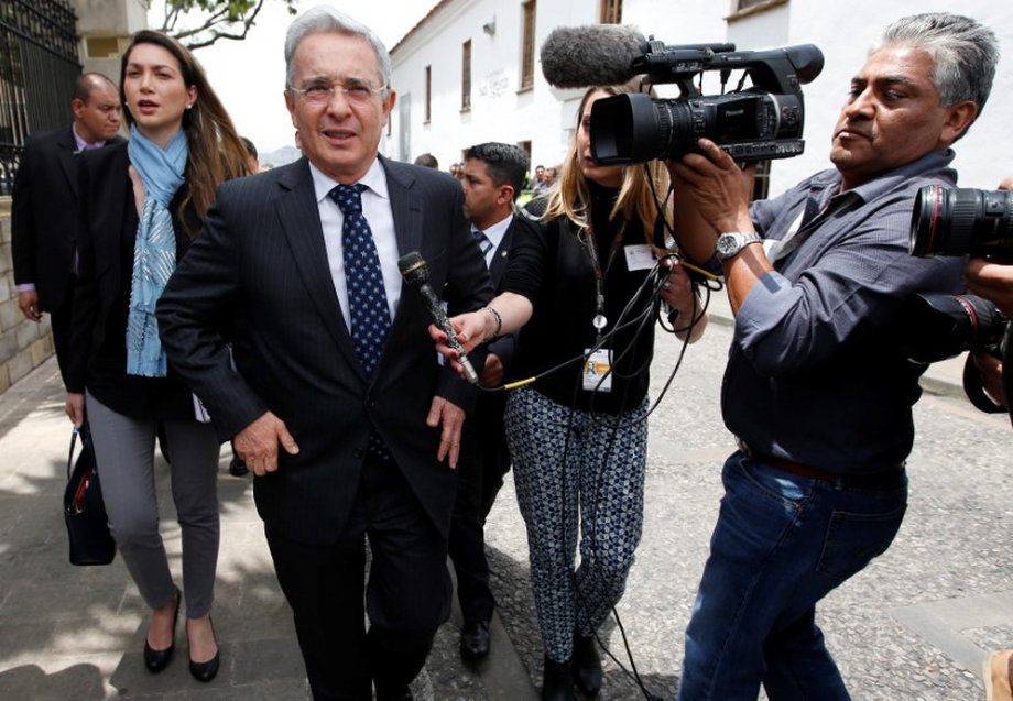 Colombian former President and current Sen. Alvaro Uribe arrives before a meeting with Colombia's President Juan Manuel Santos at Narino Palace in Bogota, Colombia, October 5, 2016.