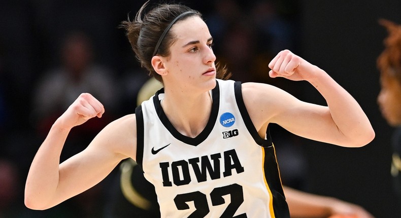 Caitlin Clark flexes during Iowa's Sweet 16 win against the Colorado Buffaloes.Alika Jenner/Getty Images