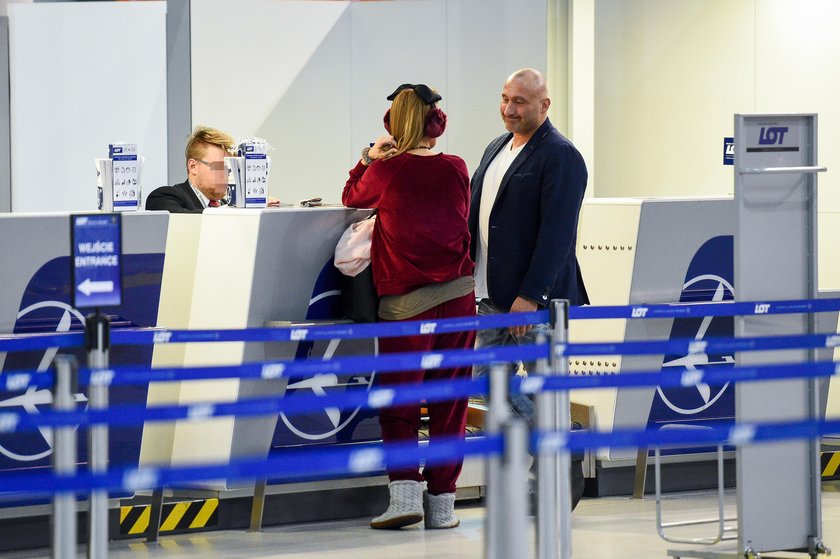 Marcin Najman i Edyta Górniak na lotnisku