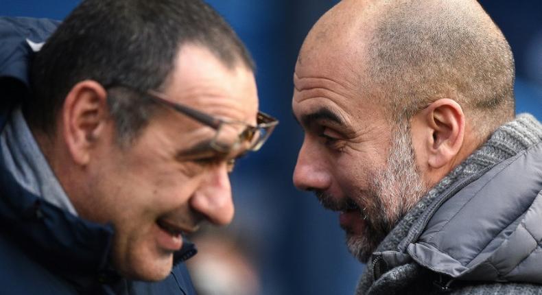 Manchester City manager Pep Guardiola (right) greets Chelsea's Maurizio Sarri