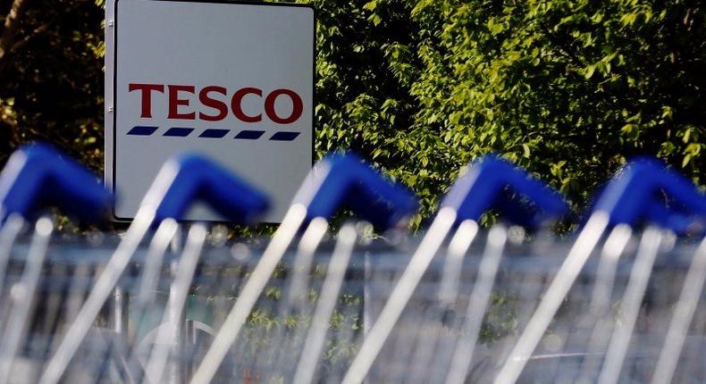 File photographs shows shopping trolleys lined up at a Tesco supermarket in London April 15, 2014. REUTERS/Luke MacGregor/Files 