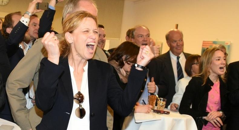 Karin Prien (R) and members of the Conservative Christian Democrats (CDU) party react to election results in Schleswig-Holstein state elections in Kiel, northern Germany, on May 7, 2017