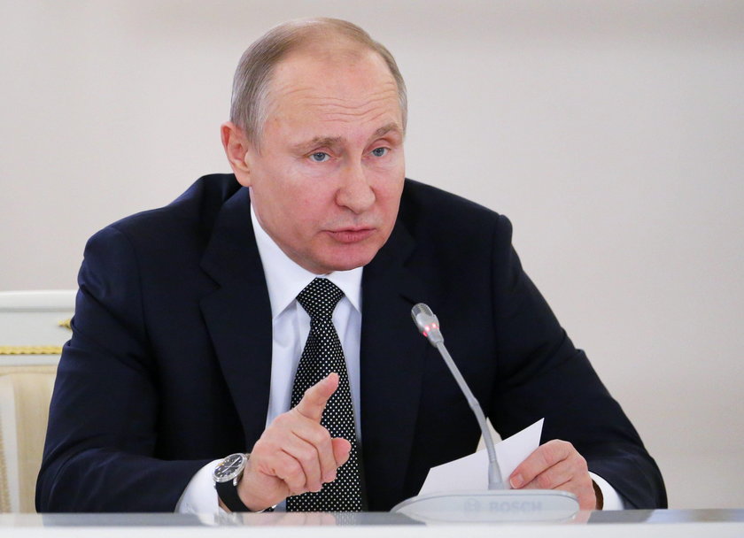 Russia's President Vladimir Putin chairs a meeting with members of the State Council in Moscow