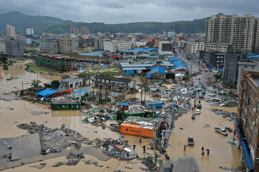 Cars are partially submerged in floodwaters after Typhoon Lekima hit Dajing town in Wenzhou, Zhejian