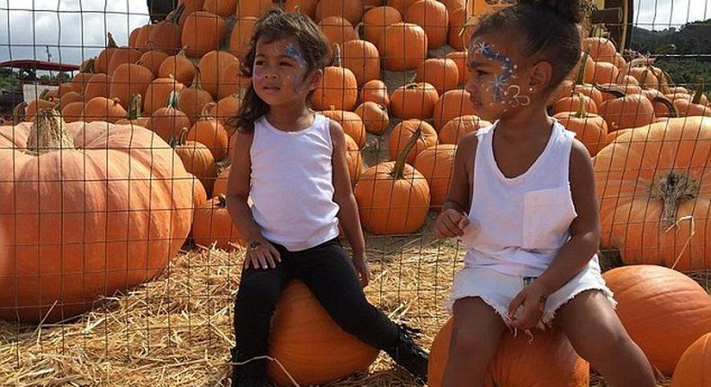 North West and her best friend at a pumpkin patch