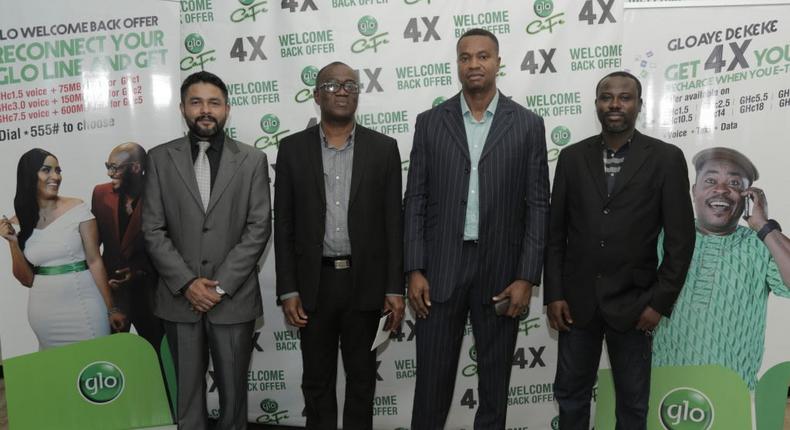 Head of Business, Glo Mobile Ghana, Mr Rowland Odolokor (4th left), flanked by Mr Abhishek Vora, Marketing (1st left) and Glo dealers, Mr Kojo Amoakum, MD, K&F Enterprises, Mr Edward Banson, MD This-&-That Enterprise, at the launch of Glo  “AyƐ DƐ kƐkƐ Recharge bonus and other propositions for the Ghana market in Accra on Monday.