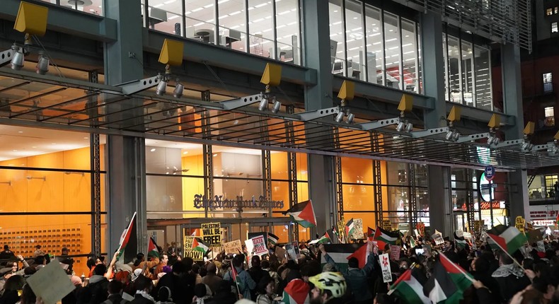 Student protestors along with other protestors block the entrance to the New York Times on Thursday, Nov. 9, in Manhattan, New York.Barry Williams/New York Daily News/Tribune News Service via Getty Images