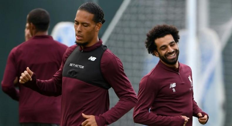 Liverpool's Mohamed Salah and Virgil van Dijk are doubts for Saturday's trip to Huddersfield