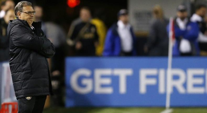 Atlanta United coach Gerardo Martino, watching his club from the sideline, was named Major League Soccer Coach of the Year on Tuesday