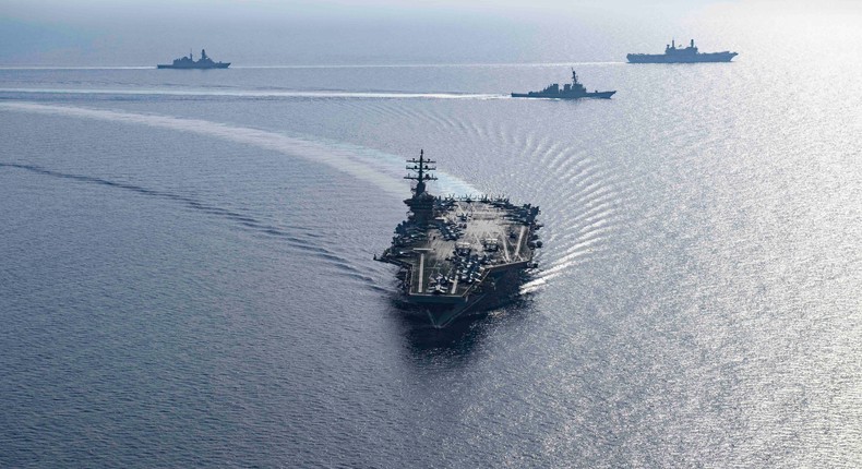 Components of the Dwight D. Eisenhower Carrier Group steam in formation with the Italian navy in the Red Sea on June 7.US Navy photo