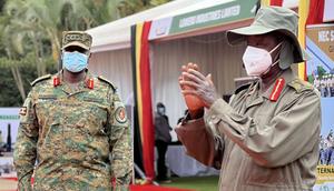 President Yoweri Museveni and Gen Muhoozi Kainerugaba at the Defense Expo in Kampala on Tuesday