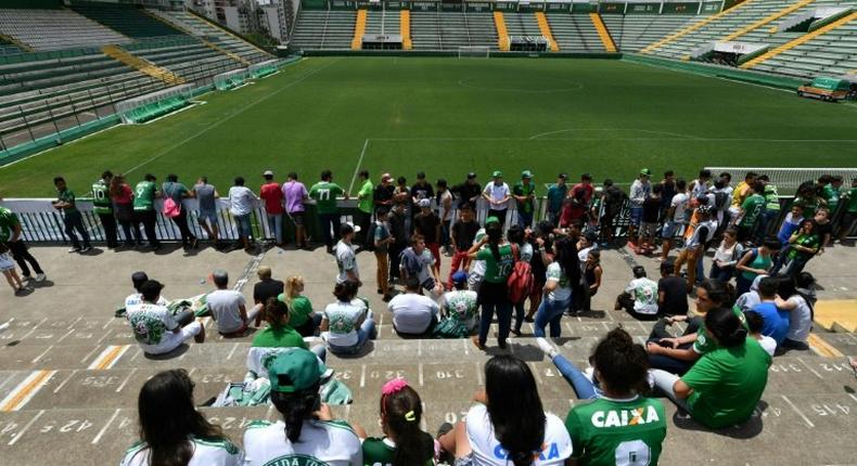 Fans pay tribute to the Brazilian football team Chapecoense Real, which was decimated by a plane crash that killed 19 of its players and 24 other club members on November 28, 2016