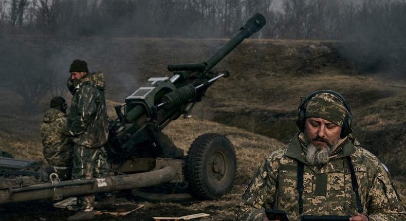 Ukrainian soldiers fire a self-propelled howitzer towards Russian positions near Bakhmut, the site of the heaviest battles, Donetsk region, Ukraine, on March 7, 2023.AP Photo/Libkos