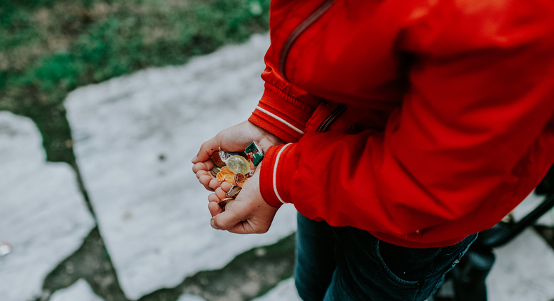 kid holding candy