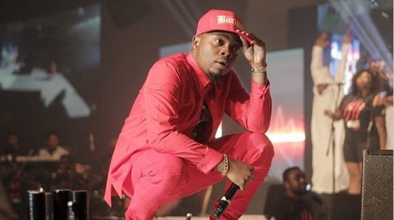 Olamide performing on stage. (Concise News)