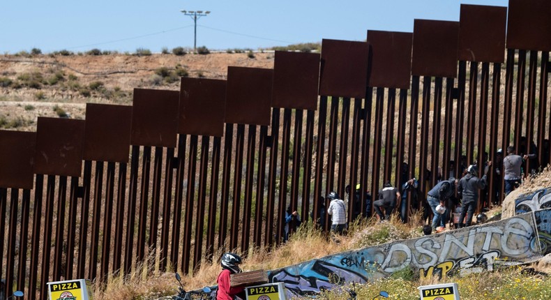 A driver makes a food delivery at the US-Mexican border on May 10.Guillermo Arias/Getty Images