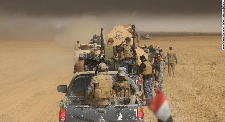 Iraqi army and militia forces arrive Thursday in Saleh village in the offensive to wrest Mosul from ISIS.