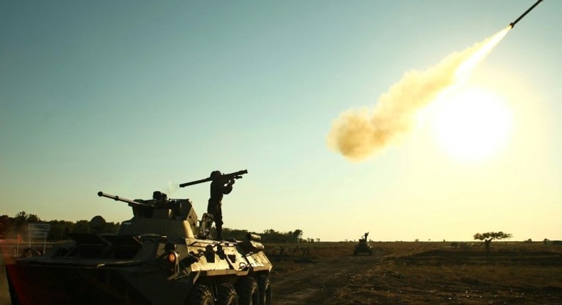 A soldier fires a portable air defense rocket during international war games Russia hosted in 2015.